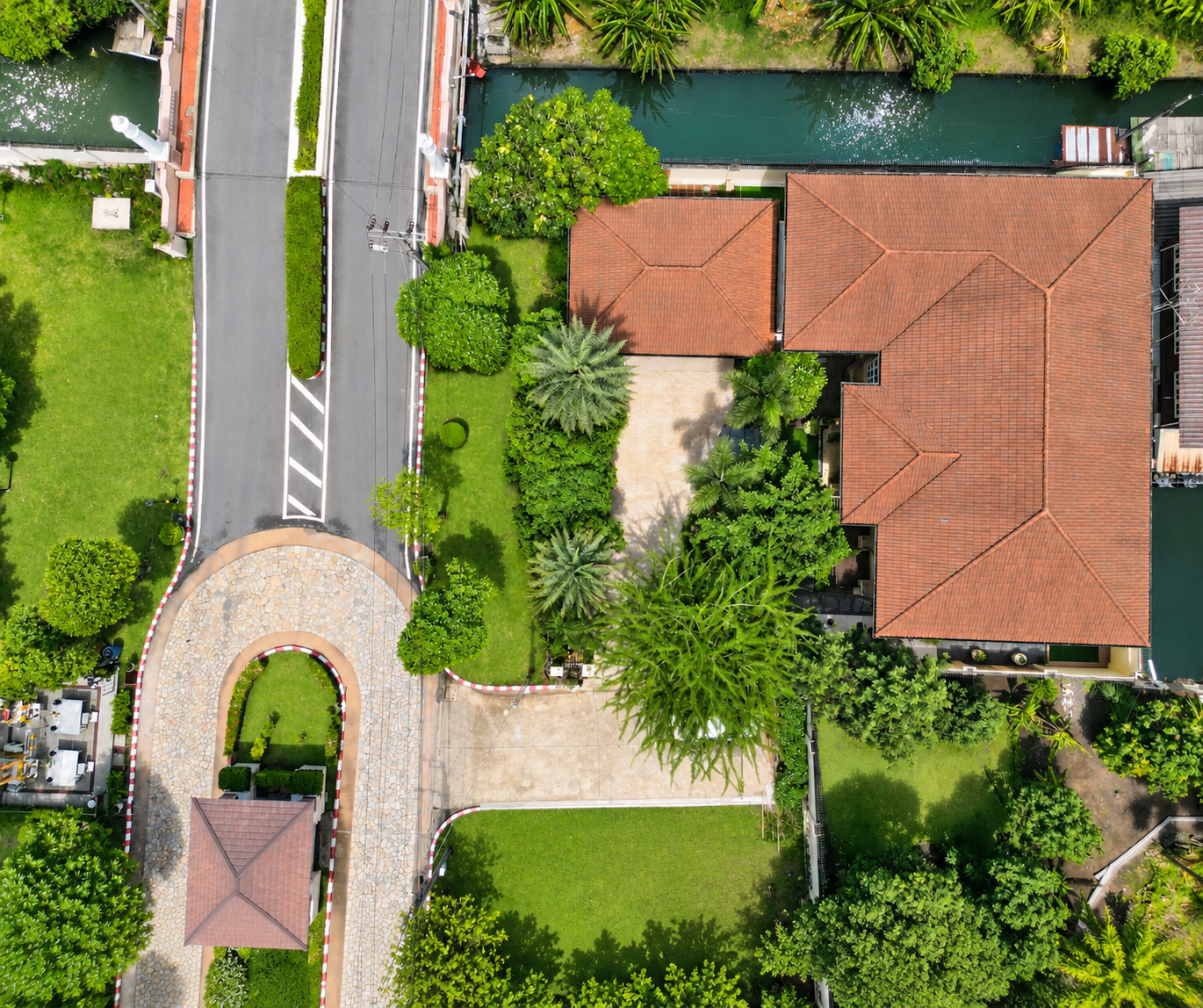 Aerial view of a large Ladawan corner home