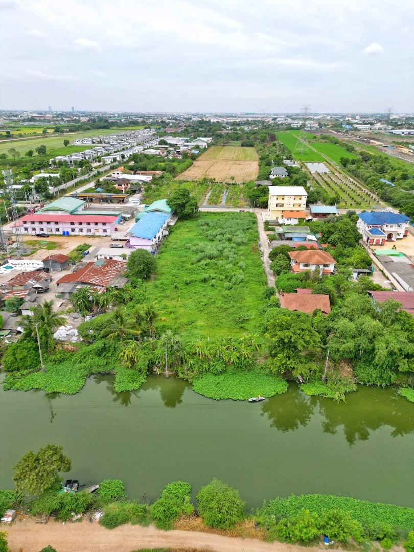 ขายที่ดินเปล่าติดคลองพระอุดม ปากเกร็ด นนทบุรี 3 ไร่ ใกล้วัดท่าเกวียน อบต. คลองข่อย ถนน 345